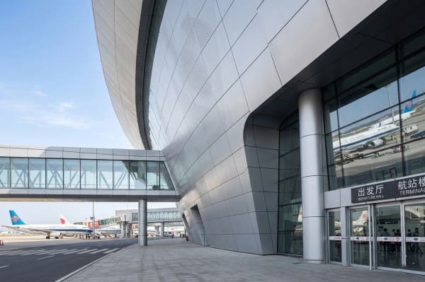 Airport terminal building with large-scale aluminum facade system