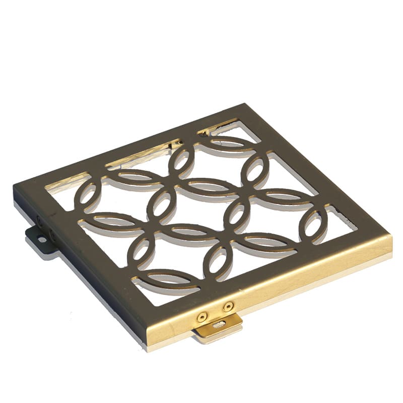 Custom shaped carved aluminum facade panel with decorative motif