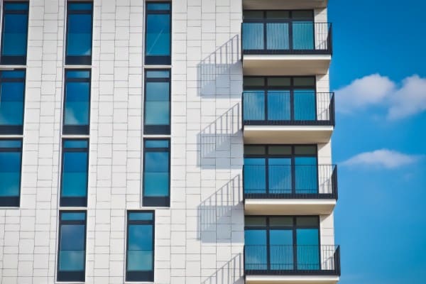 High-rise residential tower with aluminum curtain wall facade