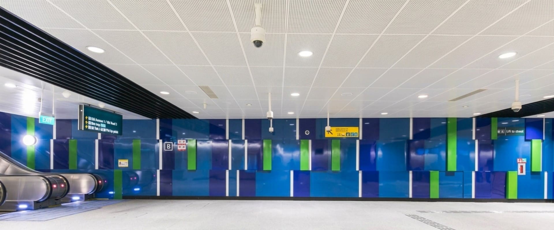 Modern aluminum baffle ceiling in commercial interior